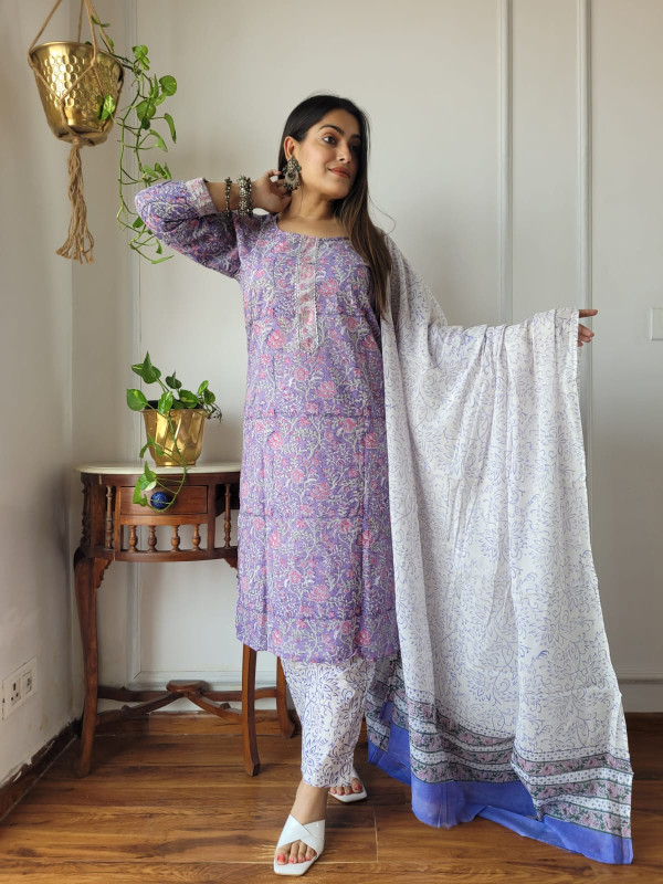 lavender and pink hand block printed cotton kurta, pants, and dupatta suit set.
