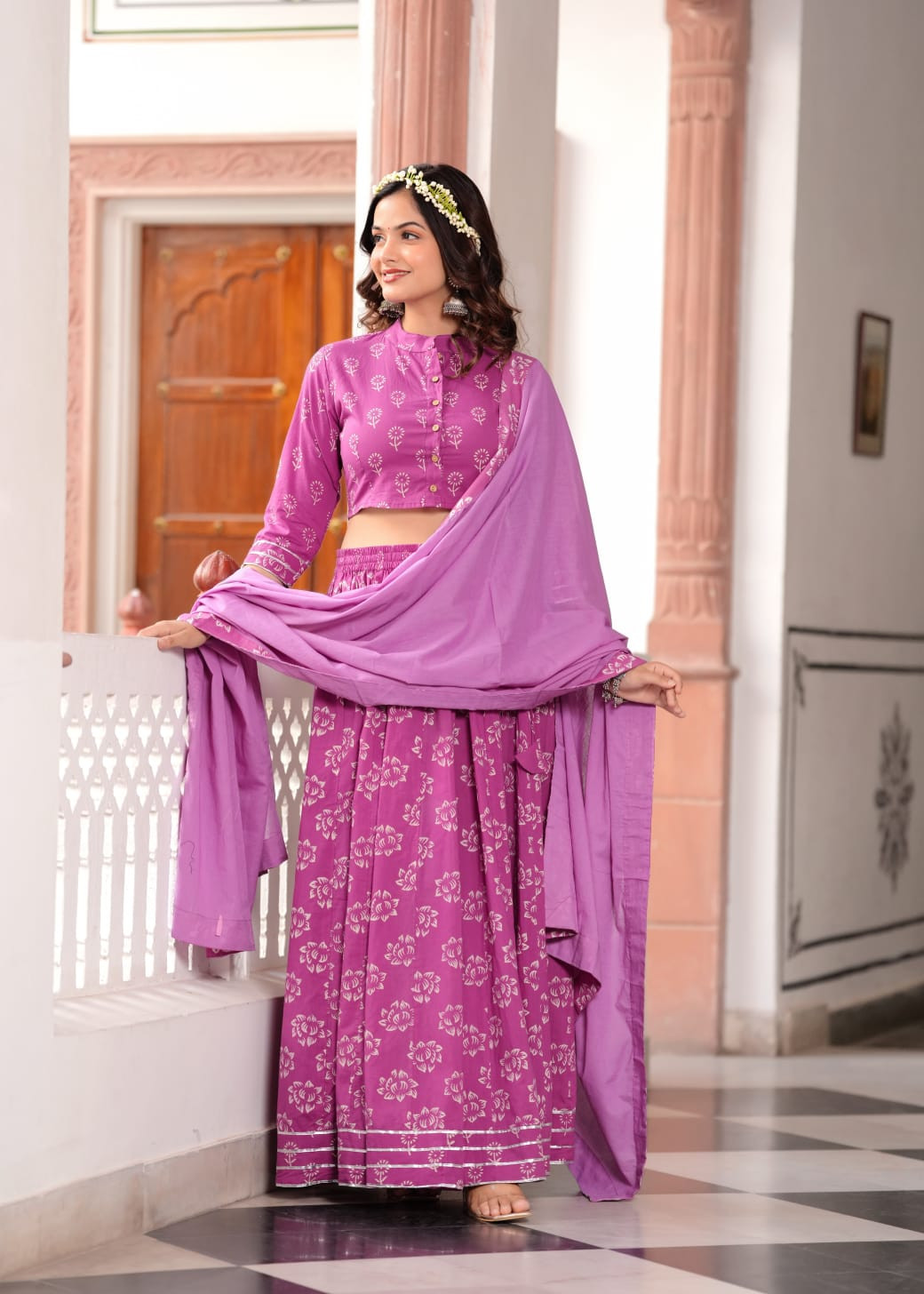 Purple Floral Printed Cotton Lehenga Choli with a matching Dupatta featuring silver Gota Patti accents.