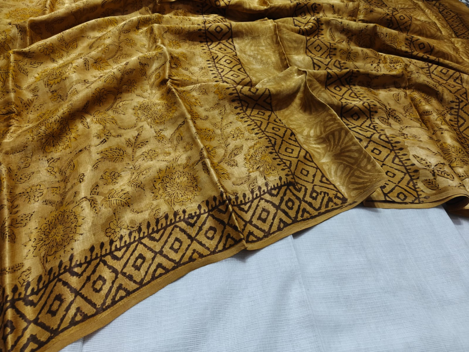 Golden Hand block printed Ajrakh Vanaspati modal silk saree.