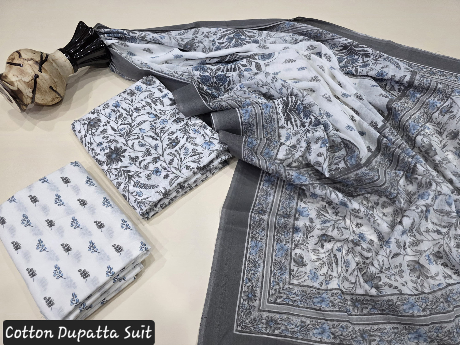 Grey/Blue/White Floral or Block Print.