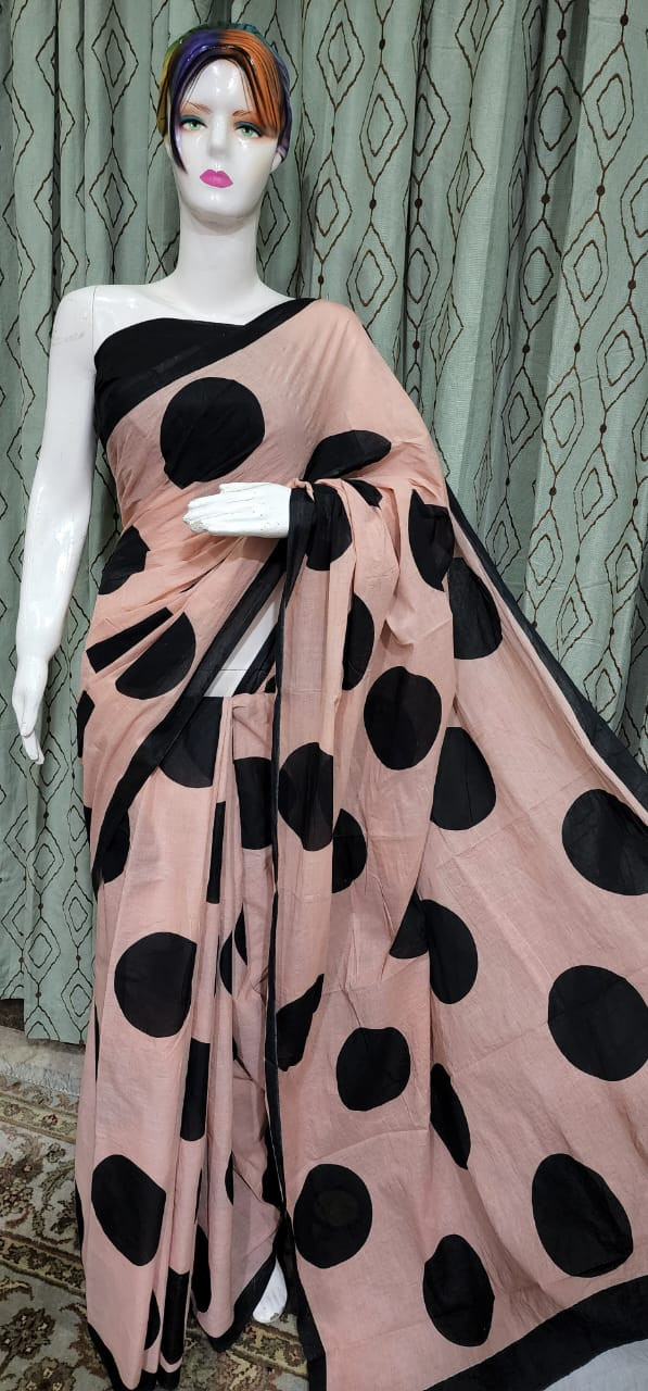 Peach-Pink Cotton Saree with Bold Black Polka Dots and Minimalist Border.