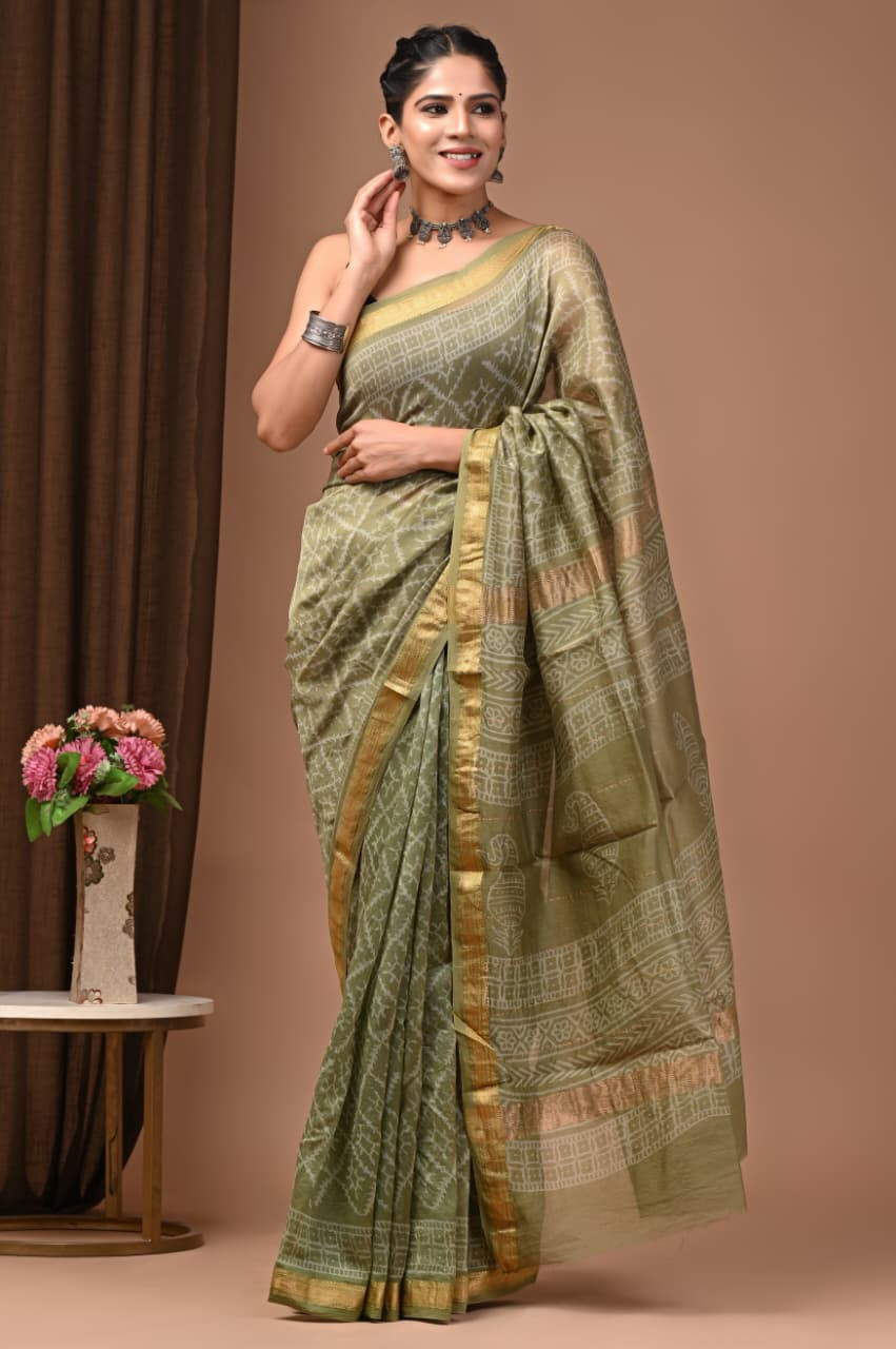 Olive Green Cotton Blend Saree with a Zari Border and Jamdani Design Jacquard Weave.