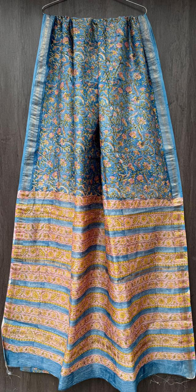 blue and pink hand-block printed silk-cotton blend Maheshwari or Chanderi saree with a gold zari border.
