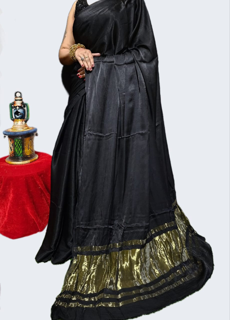 Black  with rich golden border Modal silk plain daying saree