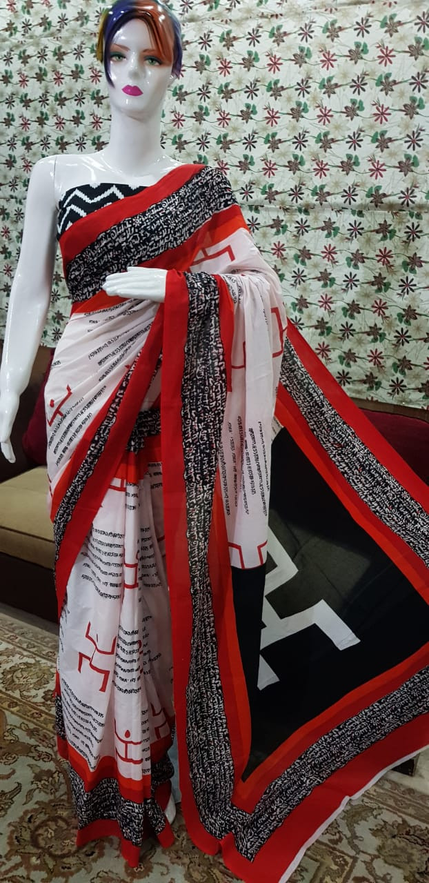 Contemporary White and Red Cotton Saree with Calligraphic Print and Bold Geometric Motifs.