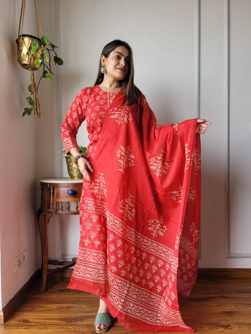 red and beige hand block printed cotton kurta, pants, and dupatta suit set