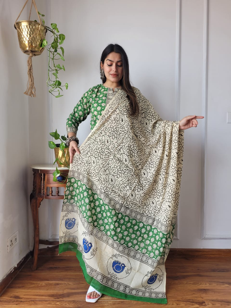 green and white hand block printed cotton kurta, pants, and dupatta suit set