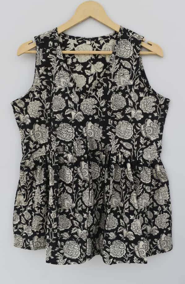 black and cream, hand-block printed, floral pattern cotton sleeveless peplum top.