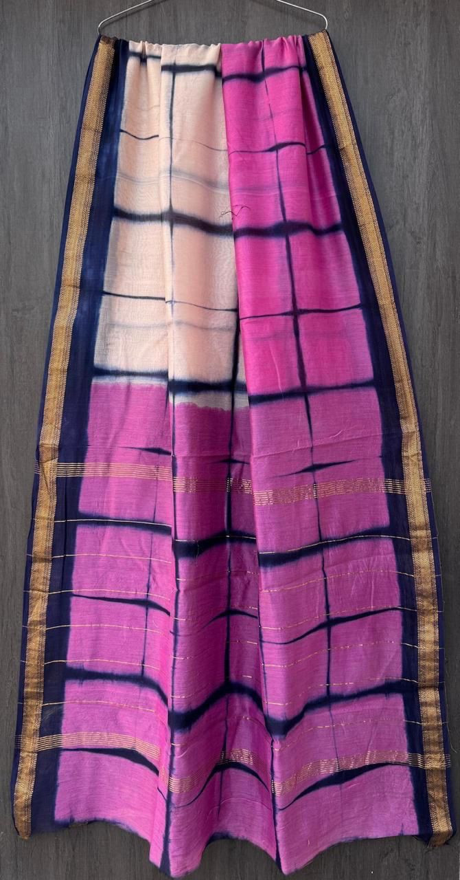 Maheshwari silk saree with a pink, cream, and blue shibori (tie-dye) and check pattern design