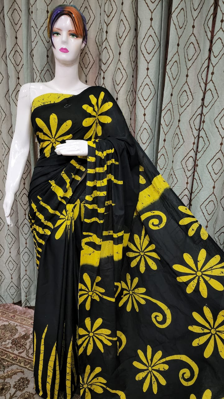 Midnight Black Cotton Saree with Sun Yellow Batik Floral and Abstract Patterns.